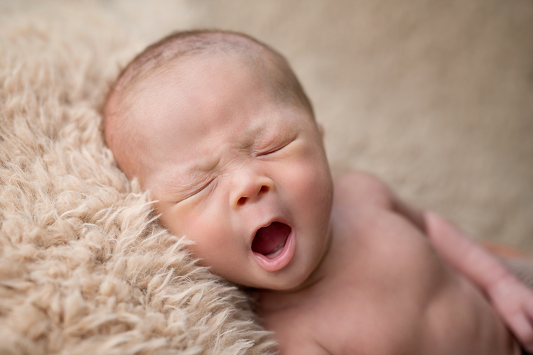 San Diego Newborn Photographer. Baby yawn