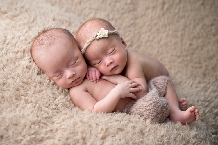 San Diego Newborn Photographer. Twins cuddling