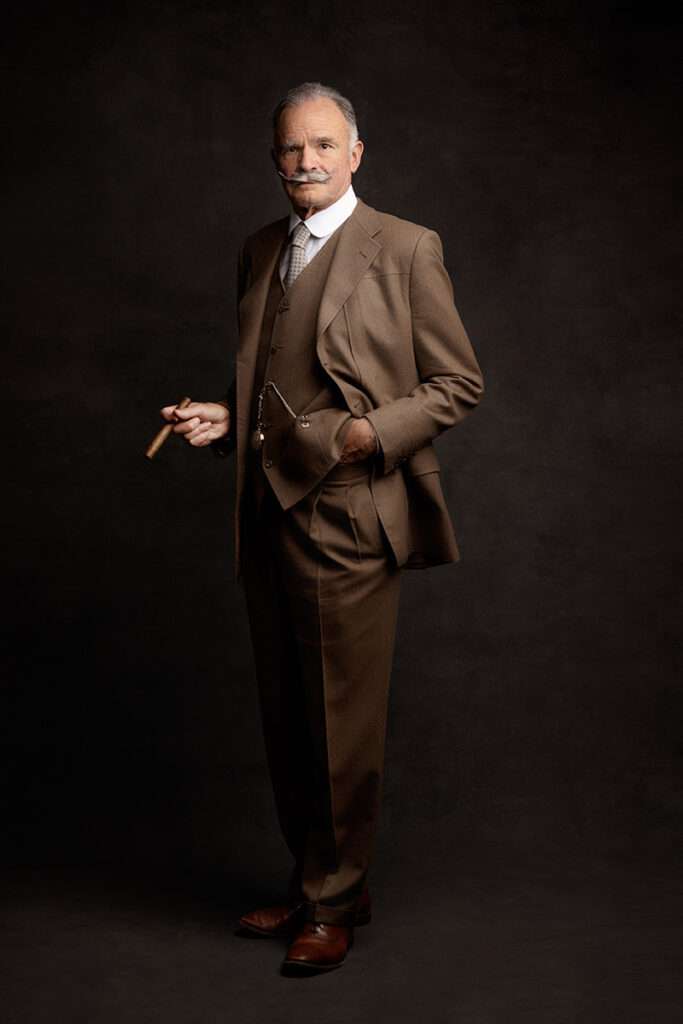 vintage portrait of men wearing brown suit and holding a cigar by headshot photographer in san diego