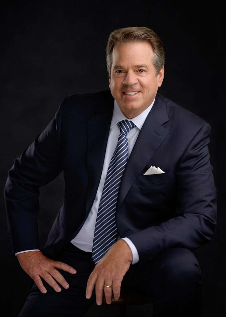 headshot of men wearing blue suit and white shit by san diego professional headshots